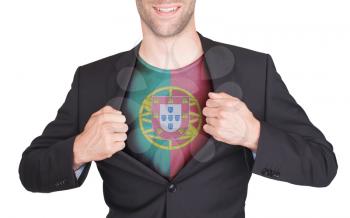 Businessman opening suit to reveal shirt with flag, Portugal