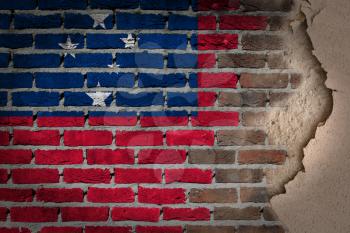 Dark brick wall texture with plaster - flag painted on wall - Samoa
