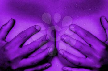 Upper part of female body, hands covering breasts, purple