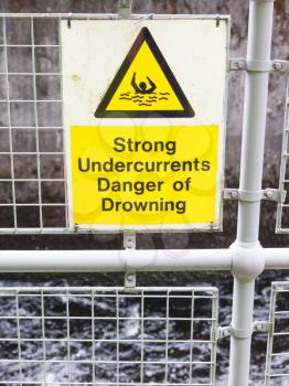 Water hazard signs, strong undercurrents, danger of drowning