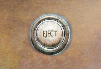 Grunge image of an old button - eject