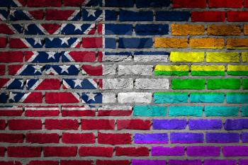 Dark brick wall texture - coutry flag and rainbow flag painted on wall - Mississippi