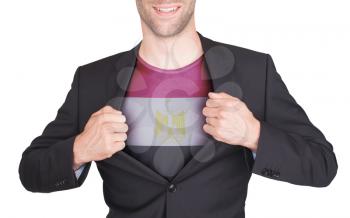 Businessman opening suit to reveal shirt with flag, Egypt