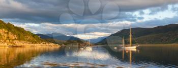 Panorama - Sailboats in a Scottish loch, evening sun