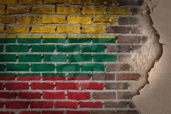 Dark brick wall texture with plaster - flag painted on wall - Lithuania