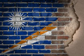 Dark brick wall texture with plaster - flag painted on wall - The Marshall Islands