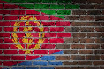 Very old dark red brick wall texture with flag - Eritrea