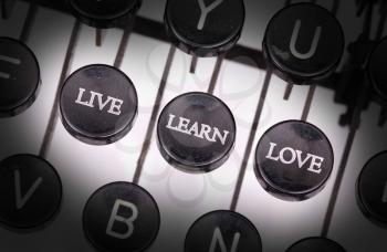 Typewriter with special buttons, live learn love