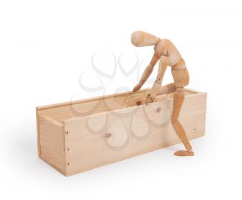Wood figure mannequin stepping in a wooden box - concept of death or retail