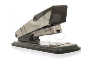 Close-up of an old rusty vintage stapler, isolated on white, selective focus