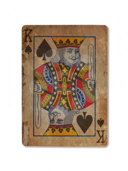 Very old playing card isolated on a white background, King of spades