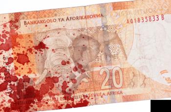 Twenty South African Rand, part of a banknote, blood