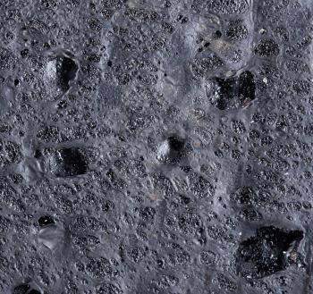 Extreme close-up of black rubber mat (background)