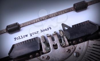 Vintage typewriter close-up - Follow your Heart message