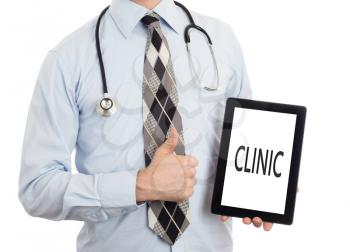 Doctor, isolated on white backgroun,  holding digital tablet - Clinic