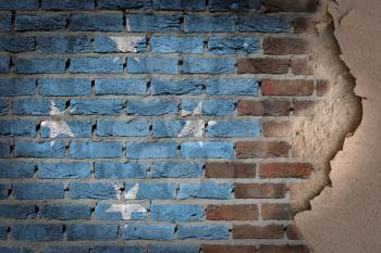 Dark brick wall texture with plaster - flag painted on wall - Micronesia