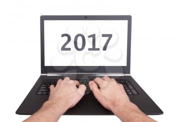 Modern laptop isolated on a white background - New Year - 2017