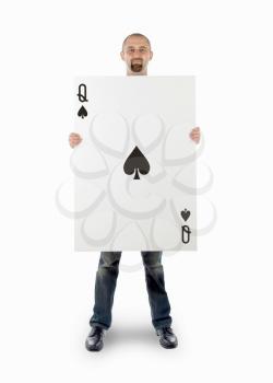 Businessman with large playing card - Queen of spades