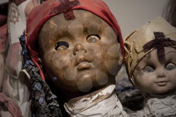 Scary black doll face, very old and broken