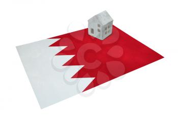 Small house on a flag - Living or migrating to Bahrain