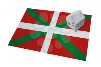 Small house on a flag - Living or migrating to Basque country