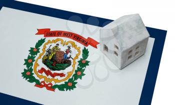 Small house on a flag - Living or migrating to West Virginia