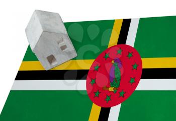Small house on a flag - Living or migrating to Dominica