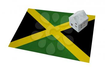 Small house on a flag - Living or migrating to Jamaica