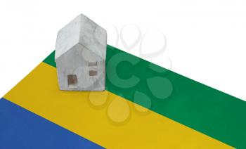 Small house on a flag - Living or migrating to Gabon