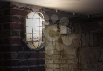 Wall light, industrial light in an old building