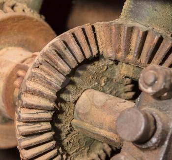 Old rusted gears on a machine in Greece