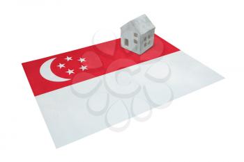 Small house on a flag - Living or migrating to Singapore