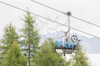 Ski lift cable booth or car with a mountainbike on the side (unmarked), Austria in summer