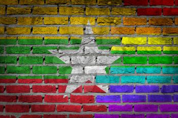 Very old dark red brick wall texture - Flag of Myanmar with rainbow flag