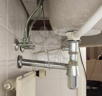 Basin siphon or sink drain in a bathroom, dirty