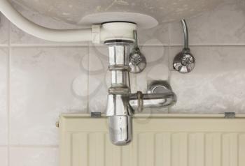 Basin siphon or sink drain in a bathroom, dirty