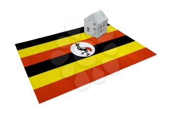 Small house on a flag - Living or migrating to Uganda