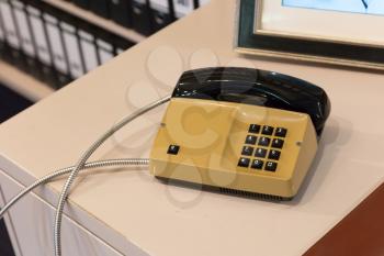 Old telephone in an office - Selective focus