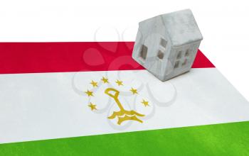 Small house on a flag - Living or migrating to Tajikistan