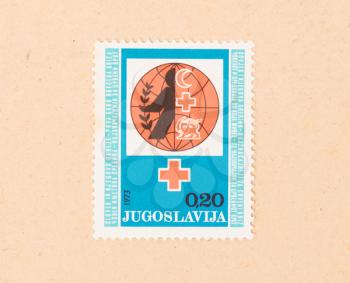 JUGOSLAVIA - CIRCA 1973: A stamp printed in Jugoslavia shows a red cross, circa 1973