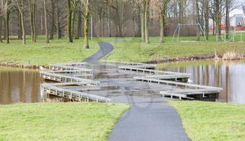 Unique bridge over a pond in the Netherlands