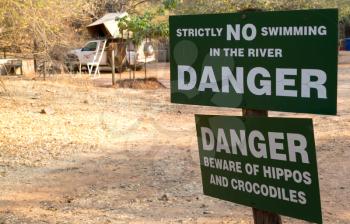 Sign boar indicated to the guests the presence of hippos - Botswana
