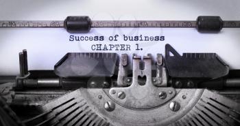 Vintage inscription made by old typewriter, success of business, chapter 1