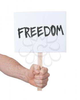 Hand holding sign, isolated on white - Freedom
