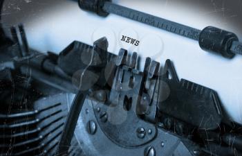 Close-up of an old typewriter with paper, selective focus, News