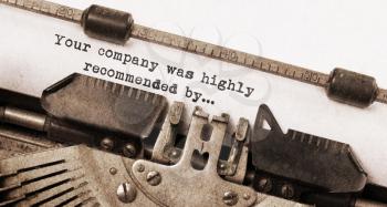 Vintage typewriter, old rusty and used, Your company was highly recommended by
