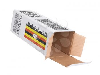 Concept of export, opened paper box - Product of Uganda