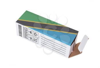 Concept of export, opened paper box - Product of Tanzania