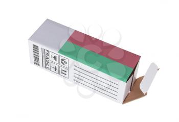 Concept of export, opened paper box - Product of Madagascar