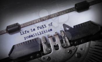 Vintage inscription made by old typewriter, Life is full of posibilities